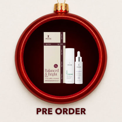 IMAGE Skincare Balance and Bright gift set displayed inside a red Christmas bauble