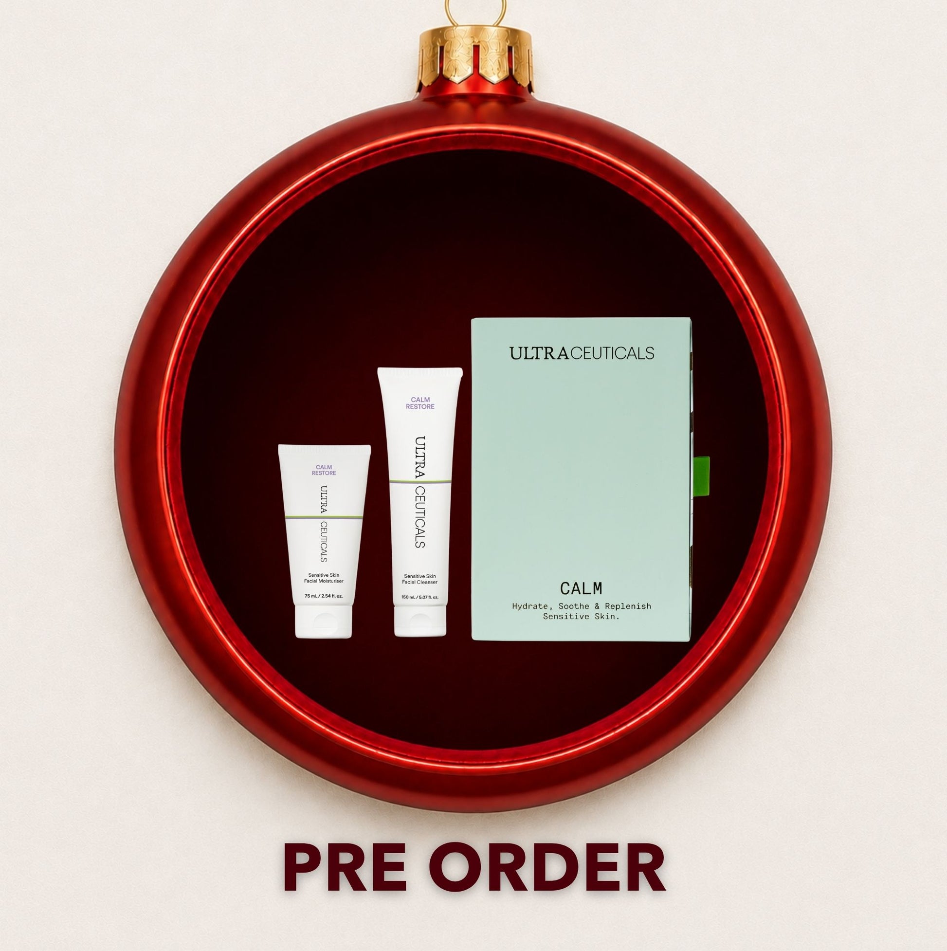 Ultraceuticals Ultra Calm gift set displayed inside a red Christmas bauble