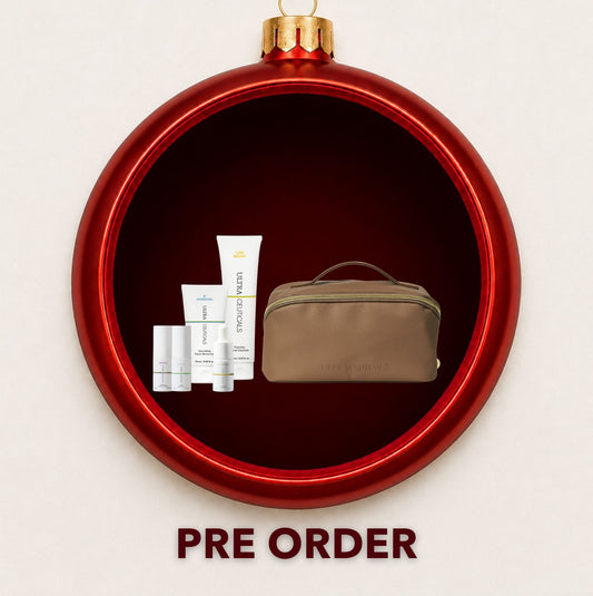 Ultraceuticals Ultra Essential gift set displayed inside a red Christmas bauble