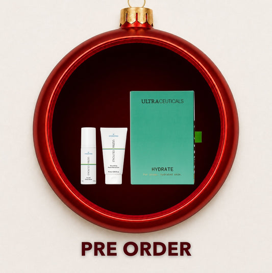 Ultraceuticals Ultra Hydrate gift set displayed inside a red Christmas bauble