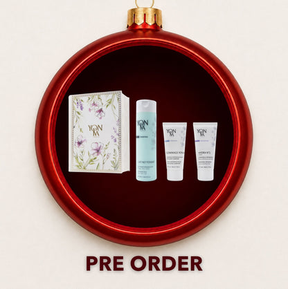 Yon-Ka Intense Hydration gift set displayed inside a red Christmas bauble