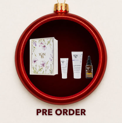 Yon-Ka Nutrition and Repair gift set displayed inside a red Christmas bauble